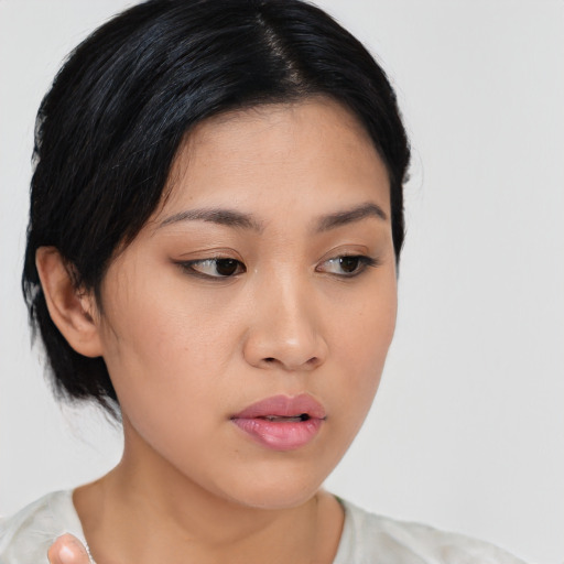 Neutral asian young-adult female with medium  black hair and brown eyes