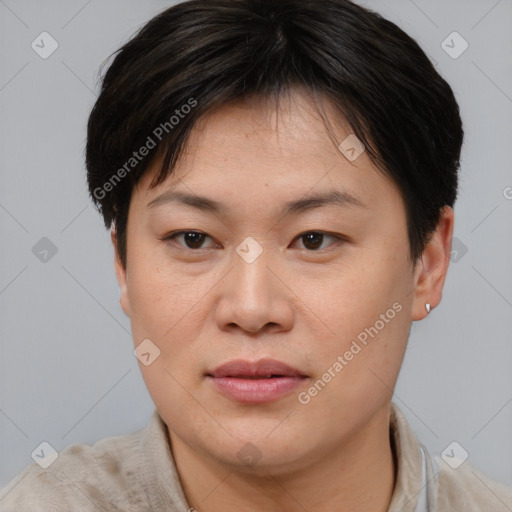 Joyful asian young-adult female with short  brown hair and brown eyes