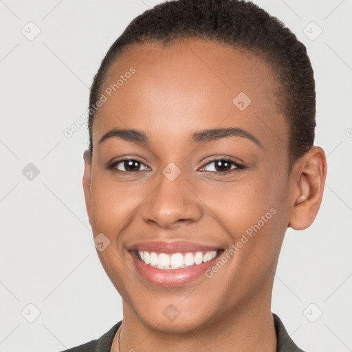 Joyful white young-adult female with short  brown hair and brown eyes