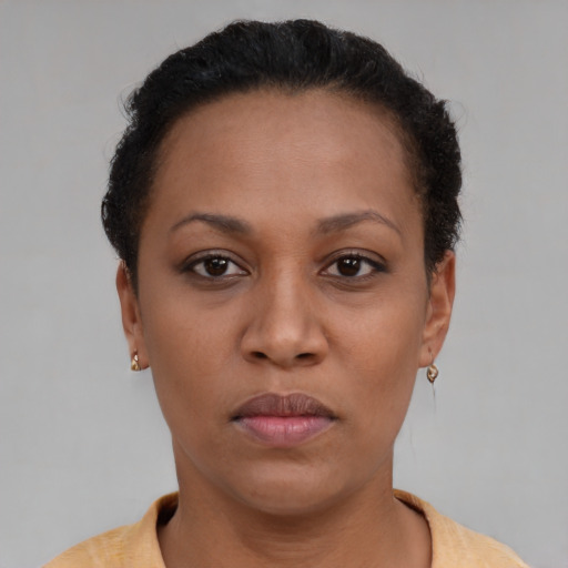 Neutral latino young-adult female with short  brown hair and brown eyes