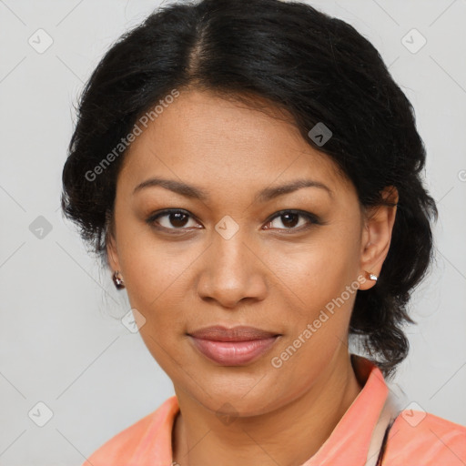 Joyful latino adult female with medium  brown hair and brown eyes