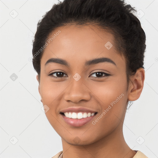 Joyful latino young-adult female with short  brown hair and brown eyes