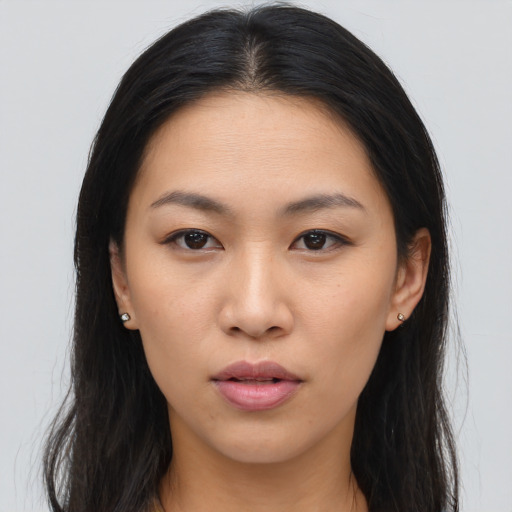 Neutral asian young-adult female with long  brown hair and brown eyes