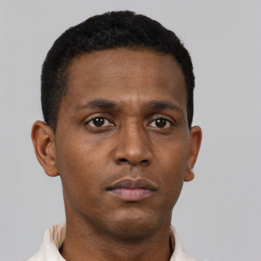 Neutral black young-adult male with short  brown hair and brown eyes