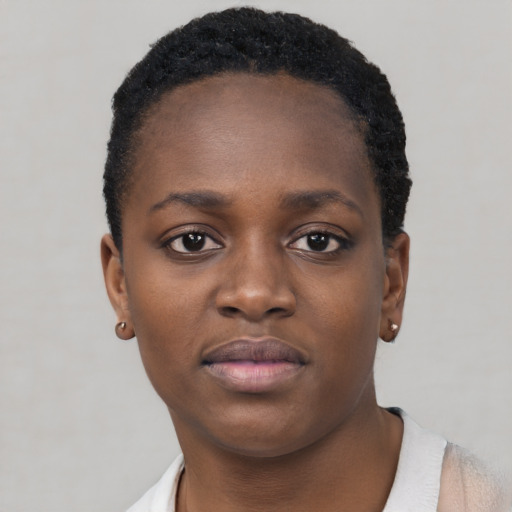 Neutral black young-adult female with short  brown hair and brown eyes