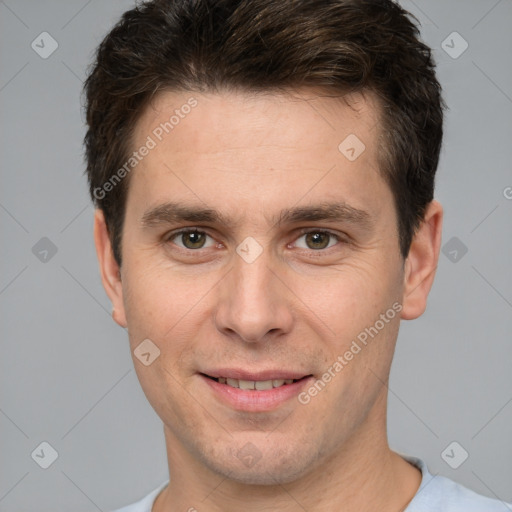 Joyful white young-adult male with short  brown hair and brown eyes