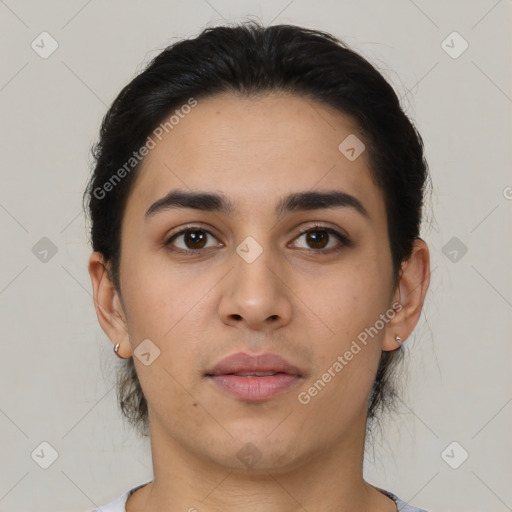 Neutral latino young-adult female with short  black hair and brown eyes