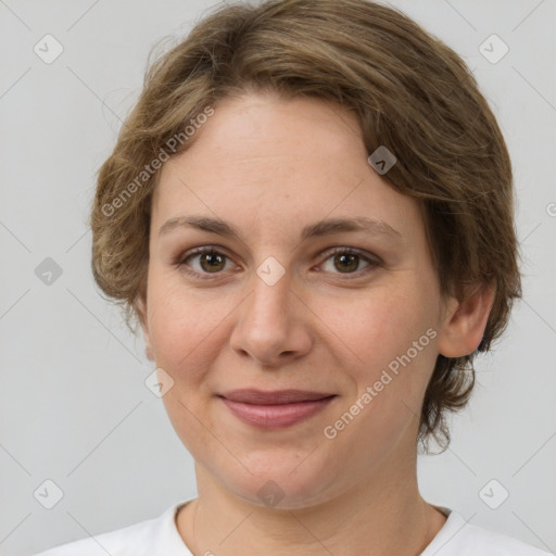 Joyful white young-adult female with medium  brown hair and green eyes