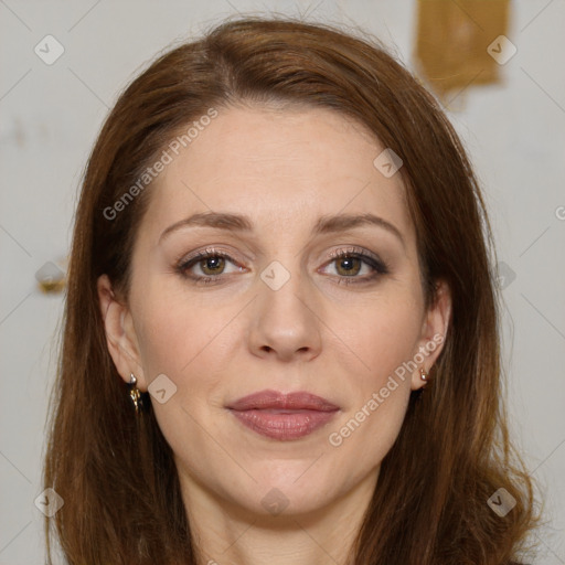 Joyful white adult female with long  brown hair and brown eyes