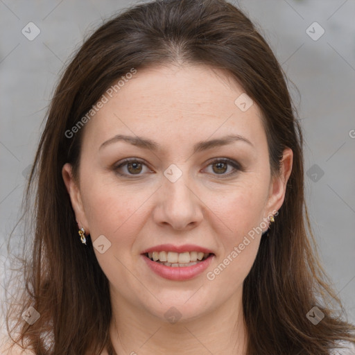 Joyful white adult female with long  brown hair and brown eyes