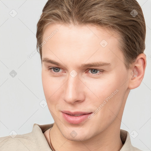 Joyful white young-adult female with short  brown hair and grey eyes