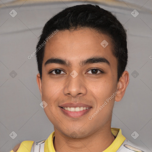 Joyful latino young-adult male with short  brown hair and brown eyes