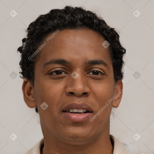 Joyful black young-adult male with short  brown hair and brown eyes