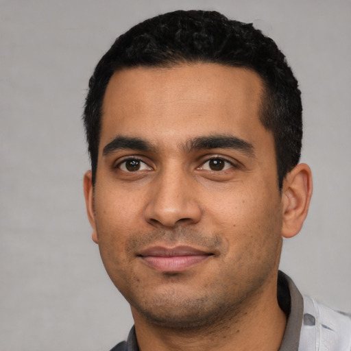 Neutral latino young-adult male with short  black hair and brown eyes