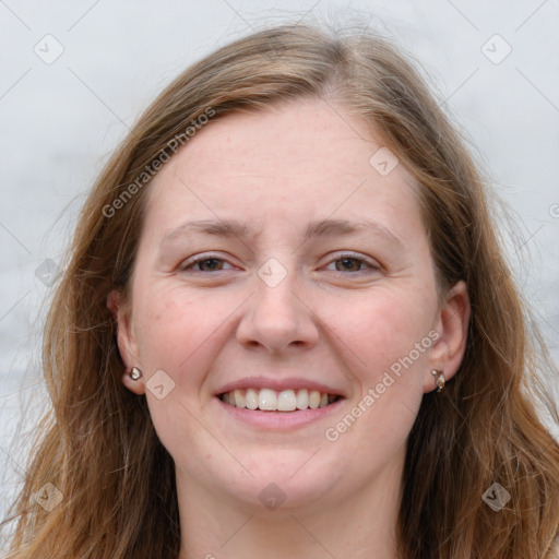 Joyful white young-adult female with long  brown hair and grey eyes