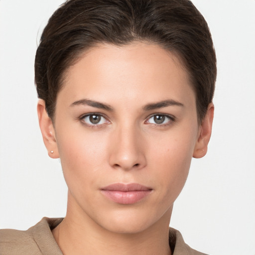 Neutral white young-adult female with short  brown hair and brown eyes