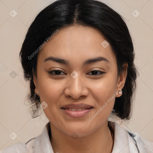 Joyful latino young-adult female with medium  brown hair and brown eyes