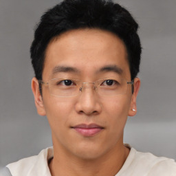 Neutral asian young-adult male with short  black hair and brown eyes