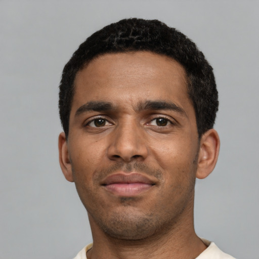 Neutral black young-adult male with short  black hair and brown eyes
