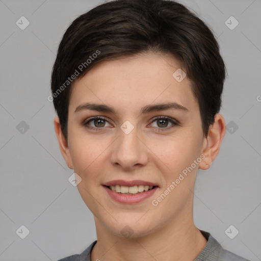 Joyful white young-adult female with short  brown hair and grey eyes