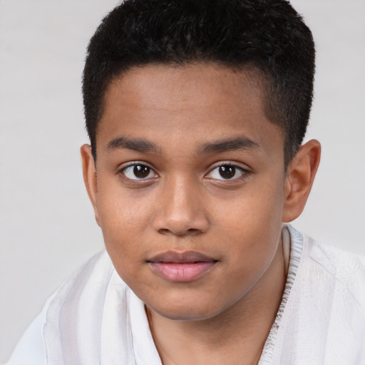 Joyful white child male with short  brown hair and brown eyes