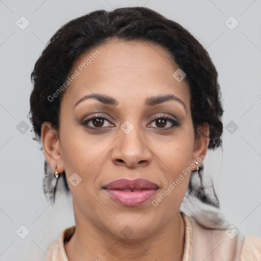 Joyful latino adult female with medium  brown hair and brown eyes