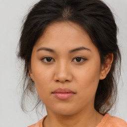 Neutral asian young-adult female with medium  brown hair and brown eyes