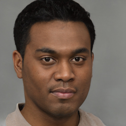 Neutral latino young-adult male with short  black hair and brown eyes