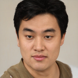 Neutral asian young-adult male with short  black hair and brown eyes