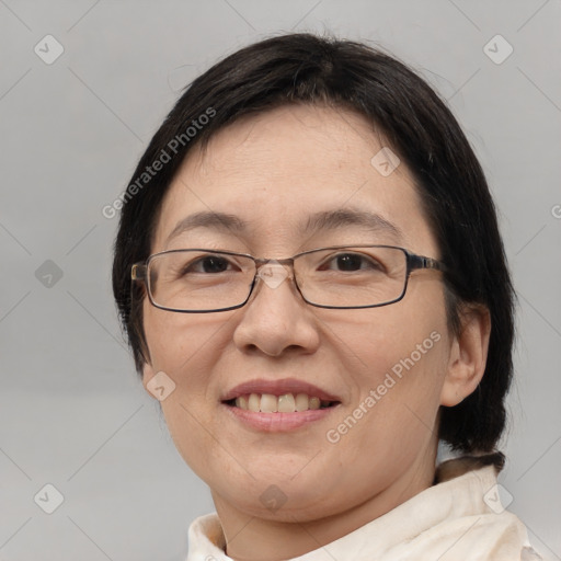 Joyful white adult female with medium  brown hair and brown eyes