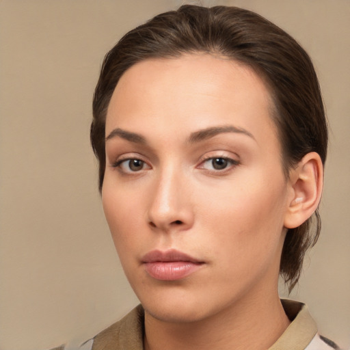 Neutral white young-adult female with medium  brown hair and brown eyes