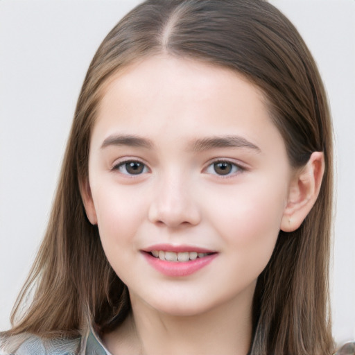 Joyful white child female with long  brown hair and brown eyes