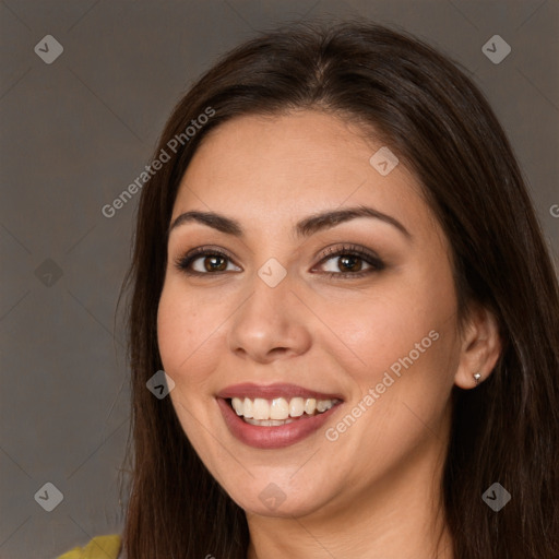 Joyful white young-adult female with long  brown hair and brown eyes