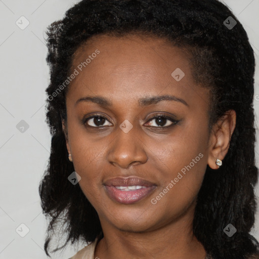 Joyful black young-adult female with medium  brown hair and brown eyes