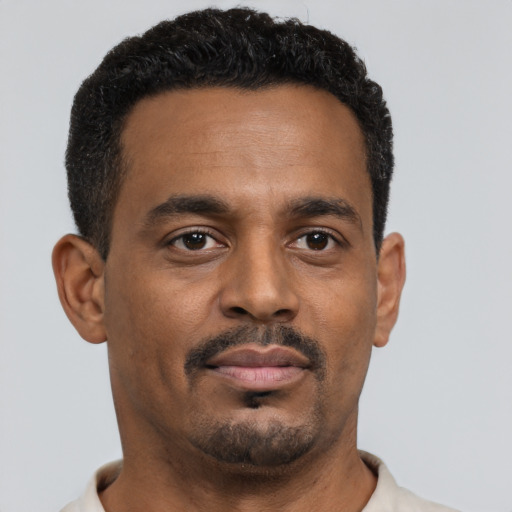 Neutral black young-adult male with short  brown hair and brown eyes