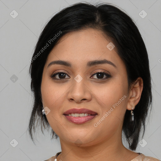 Joyful asian young-adult female with medium  black hair and brown eyes