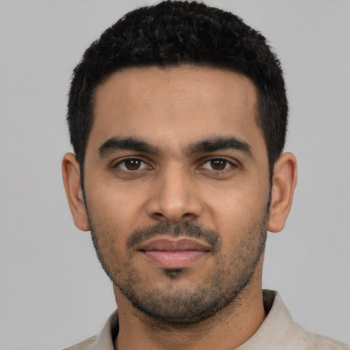 Neutral latino young-adult male with short  black hair and brown eyes