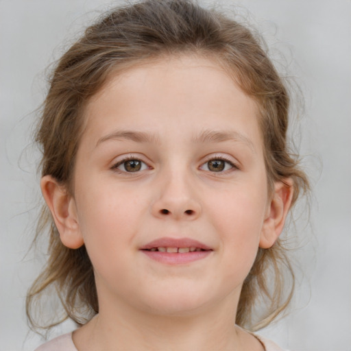 Joyful white child female with medium  brown hair and brown eyes