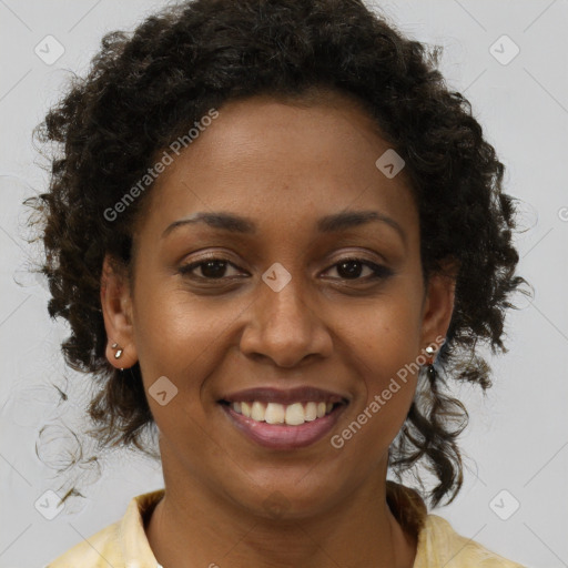 Joyful black young-adult female with medium  brown hair and brown eyes