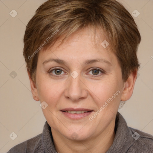 Joyful white adult female with short  brown hair and brown eyes