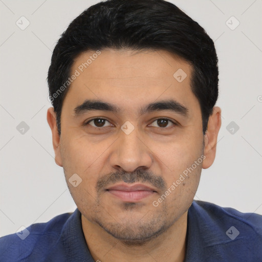 Joyful latino young-adult male with short  black hair and brown eyes