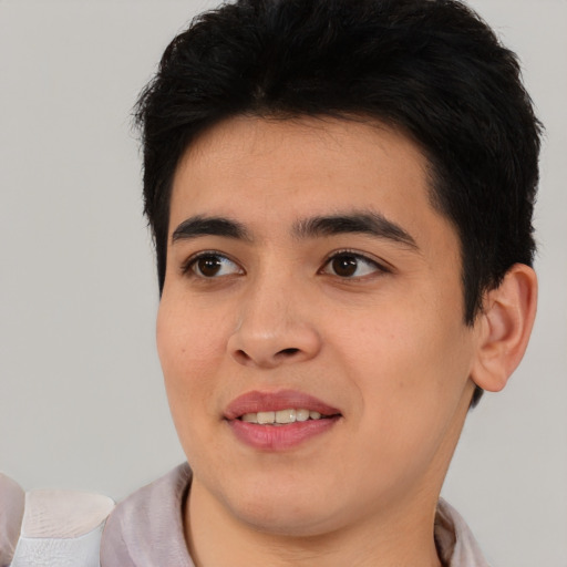 Joyful asian young-adult male with short  black hair and brown eyes