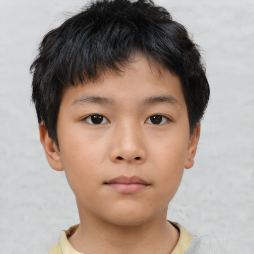 Neutral asian child male with short  brown hair and brown eyes