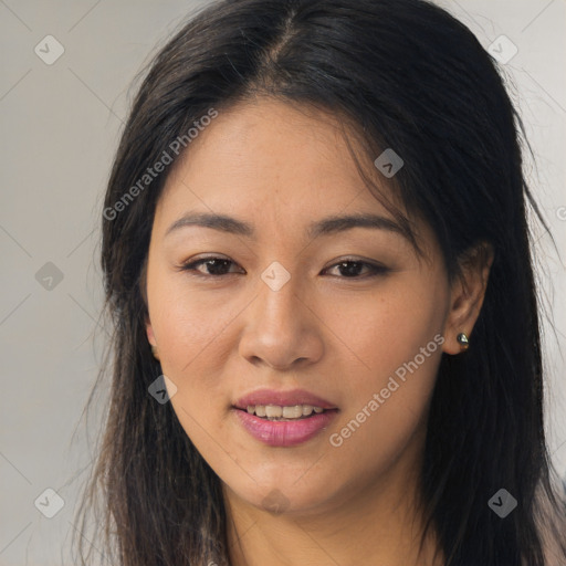 Joyful asian young-adult female with long  brown hair and brown eyes