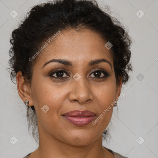 Joyful black adult female with medium  brown hair and brown eyes