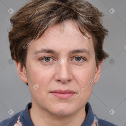 Joyful white adult male with short  brown hair and grey eyes