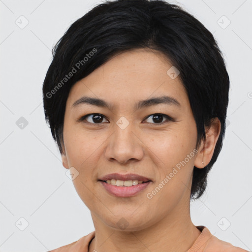 Joyful asian young-adult female with medium  black hair and brown eyes