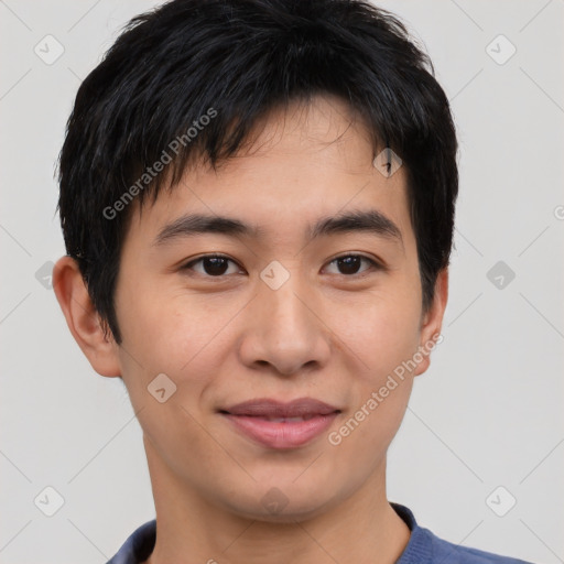 Joyful asian young-adult male with short  brown hair and brown eyes