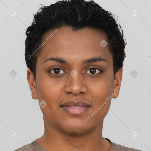 Joyful black young-adult female with short  black hair and brown eyes