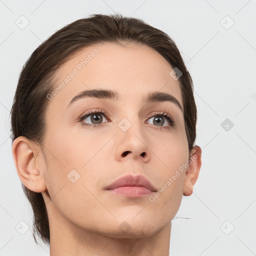 Neutral white young-adult female with medium  brown hair and brown eyes